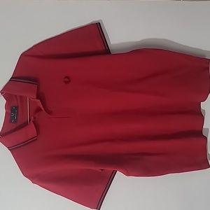 Fred Perry Polo Shirt. Size 40". Red color. Slightly used and in good condition.